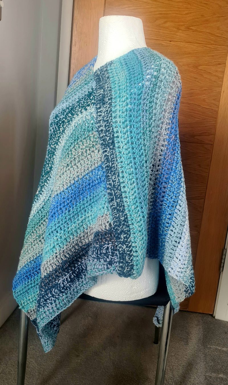 Blue crochet poncho