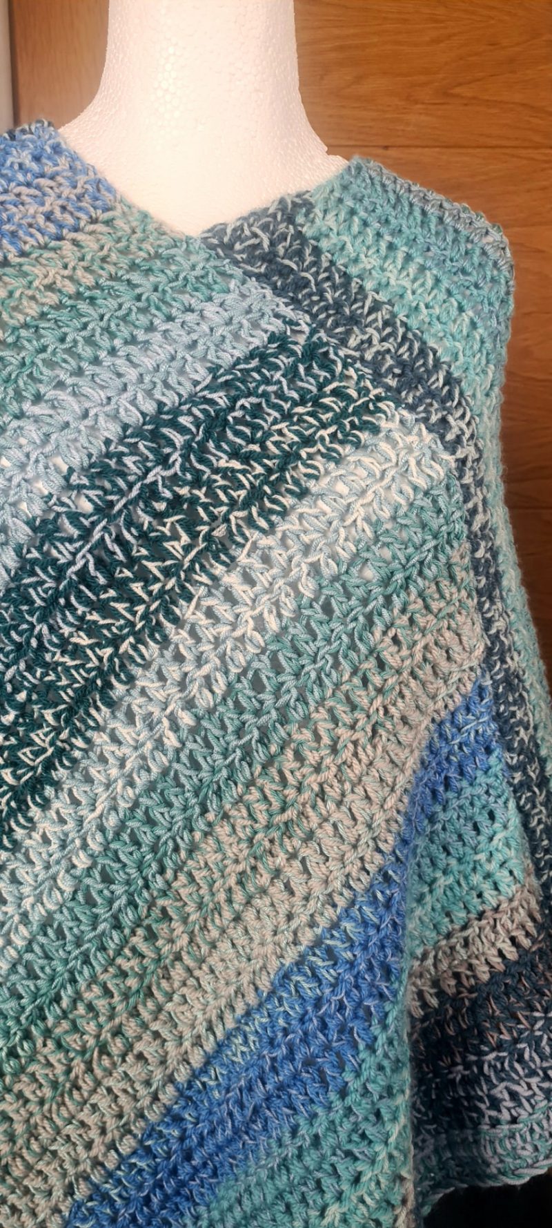 Blue crochet poncho