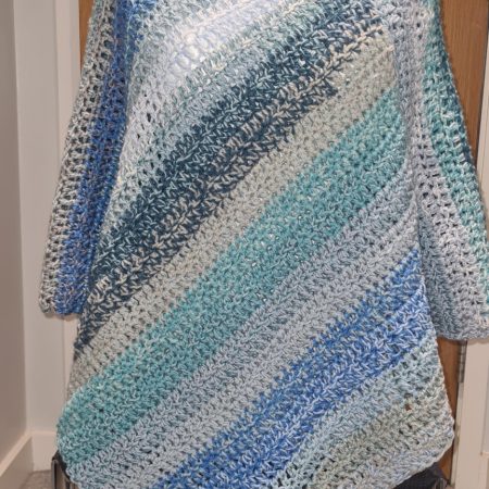 Blue crochet poncho