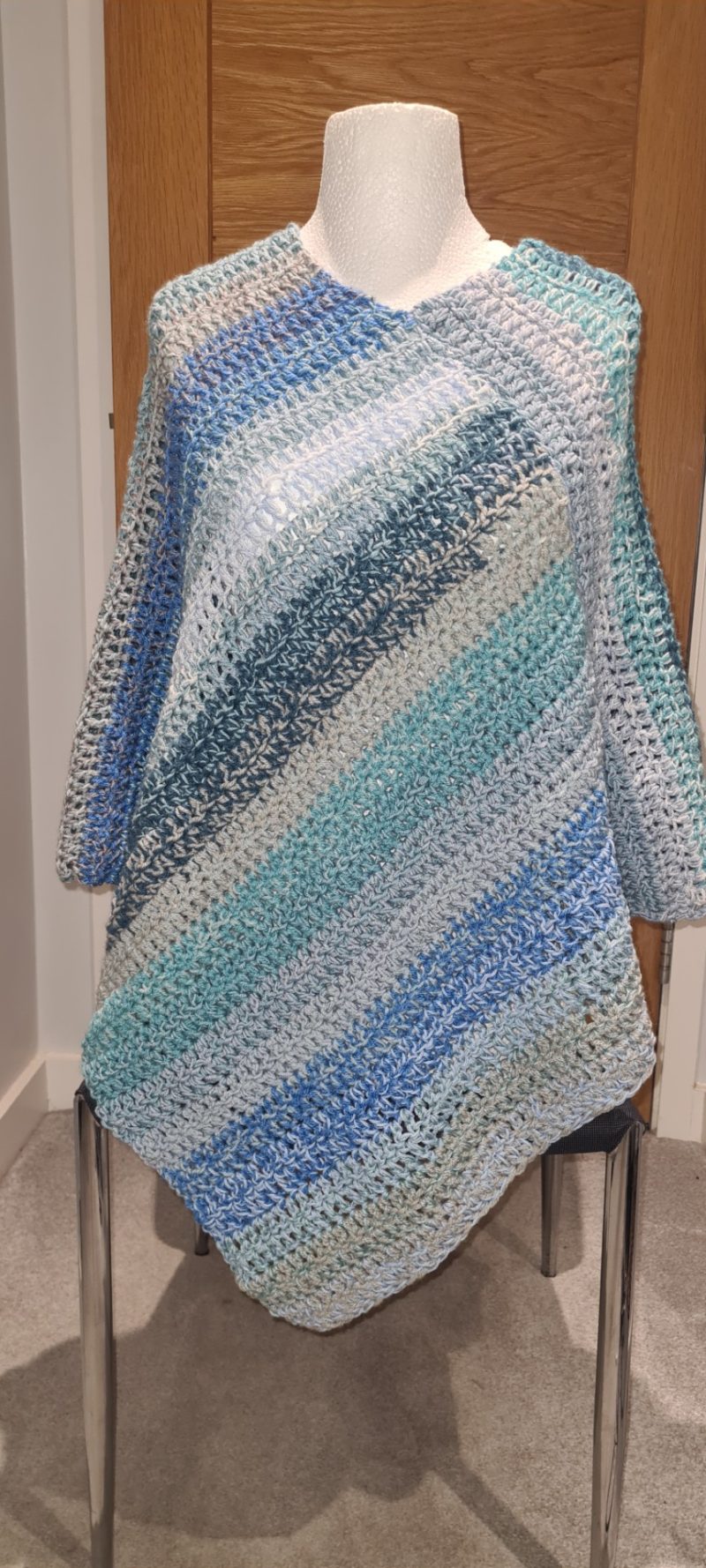 Blue crochet poncho
