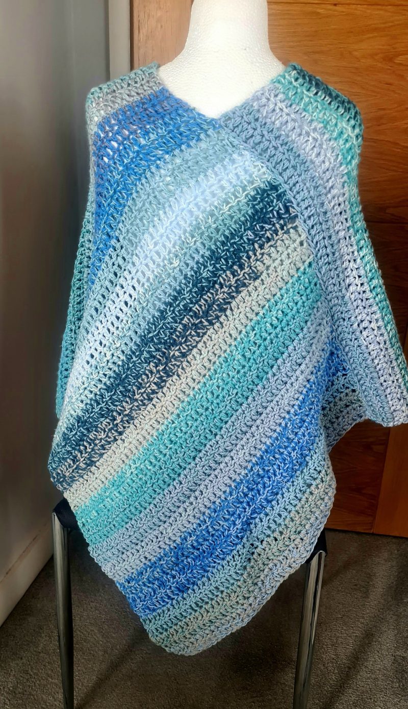 Blue crochet poncho
