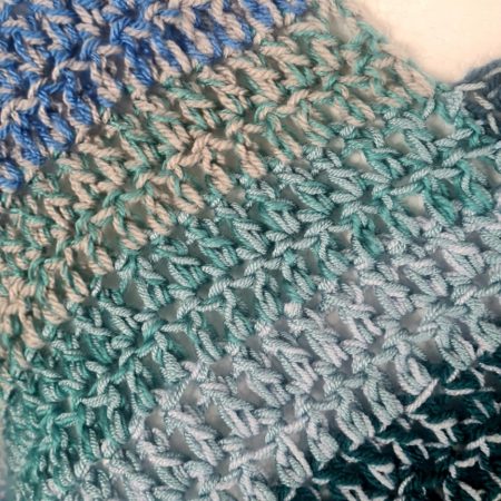 Blue crochet poncho