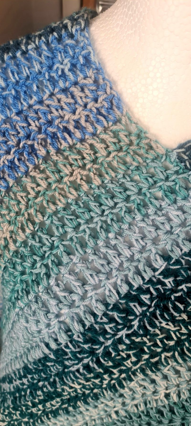Blue crochet poncho