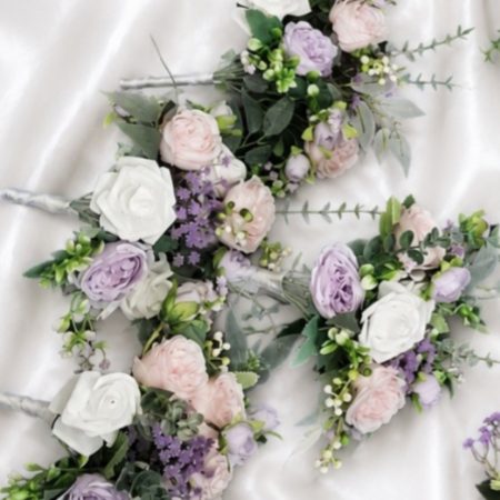 Wedding flower arrangements. All you need. Bride's bouquet, Groom's boutonniere, 4 Bridesmaid'sbouquets, 4 Groomsman boutonnieres, Flower basket & headpiece for Flower girl, "Something blue'. All handmade from artificial silk flowers.