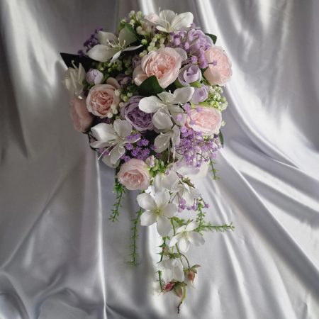 Wedding flower arrangements. All you need. Bride's bouquet, Groom's boutonniere, 4 Bridesmaid'sbouquets, 4 Groomsman boutonnieres, Flower basket & headpiece for Flower girl, "Something blue'. All handmade from artificial silk flowers.