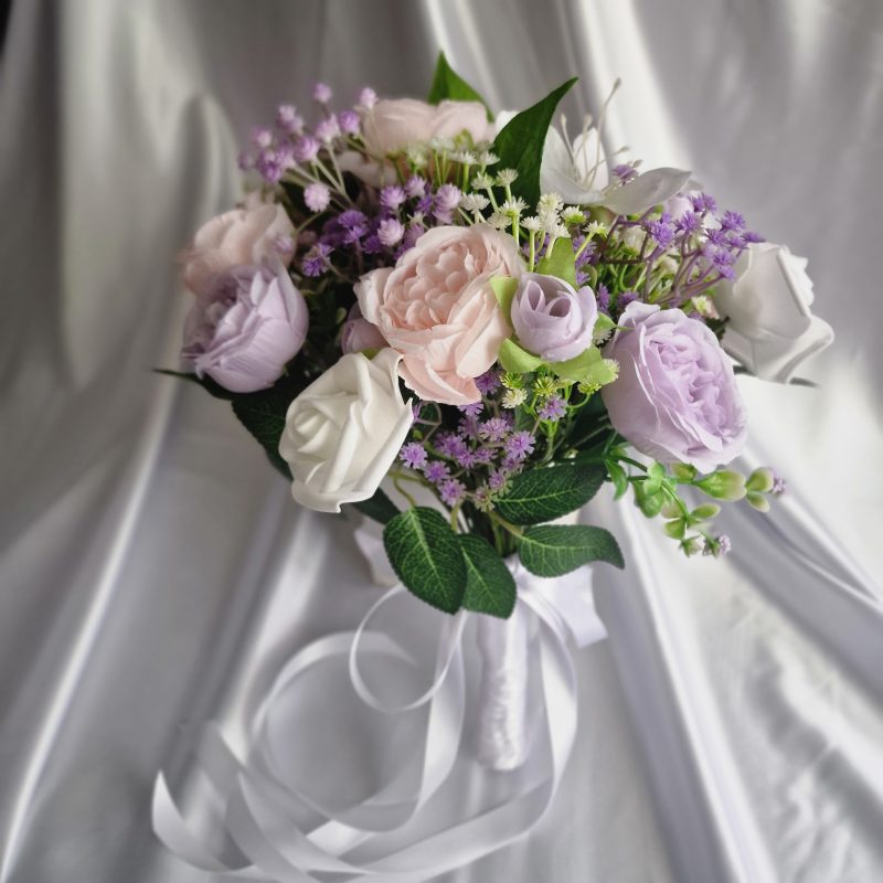Wedding flower arrangements. All you need. Bride's bouquet, Groom's boutonniere, 4 Bridesmaid'sbouquets, 4 Groomsman boutonnieres, Flower basket & headpiece for Flower girl, "Something blue'. All handmade from artificial silk flowers.