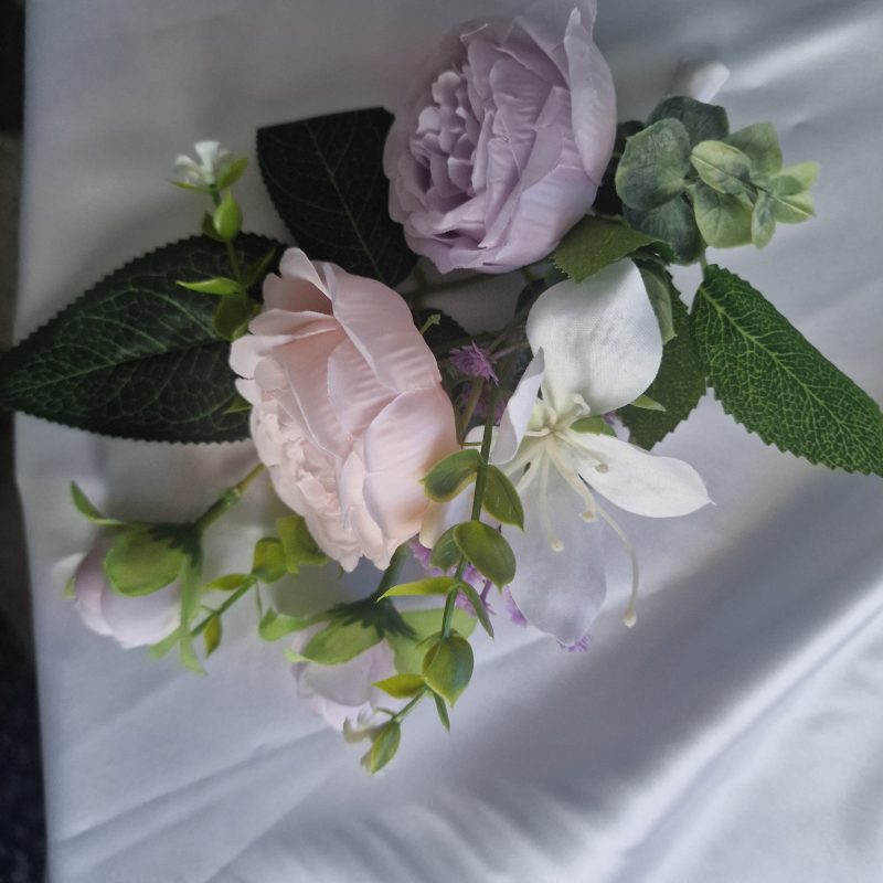Wedding flower arrangements. All you need. Bride's bouquet, Groom's boutonniere, 4 Bridesmaid'sbouquets, 4 Groomsman boutonnieres, Flower basket & headpiece for Flower girl, "Something blue'. All handmade from artificial silk flowers.
