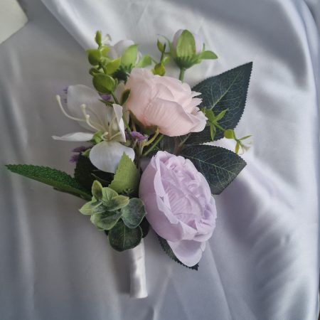 Wedding flower arrangements. All you need. Bride's bouquet, Groom's boutonniere, 4 Bridesmaid'sbouquets, 4 Groomsman boutonnieres, Flower basket & headpiece for Flower girl, "Something blue'. All handmade from artificial silk flowers.