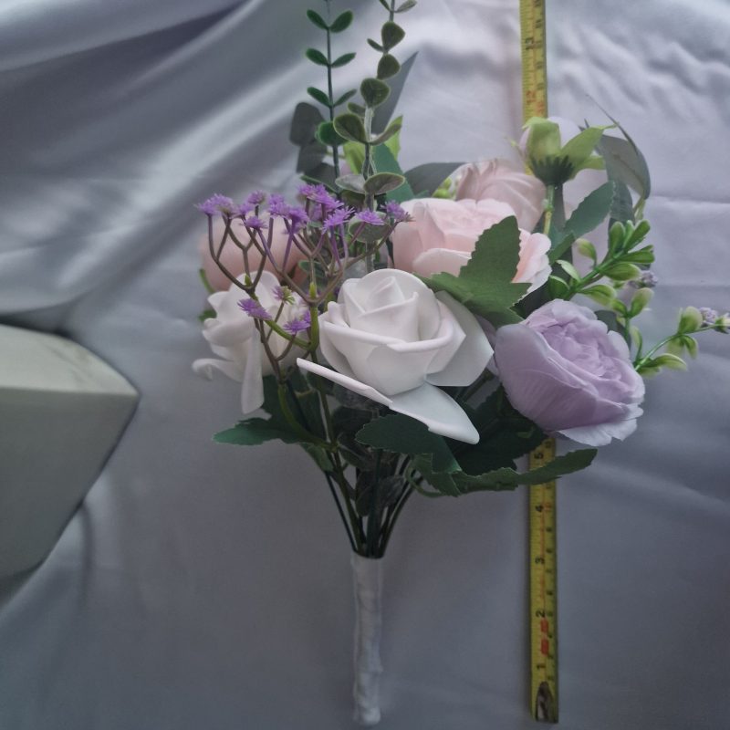 Wedding flower arrangements. All you need. Bride's bouquet, Groom's boutonniere, 4 Bridesmaid'sbouquets, 4 Groomsman boutonnieres, Flower basket & headpiece for Flower girl, "Something blue'. All handmade from artificial silk flowers.