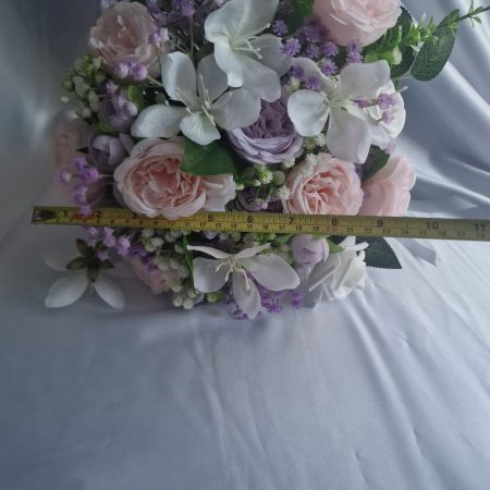 Wedding flower arrangements. All you need. Bride's bouquet, Groom's boutonniere, 4 Bridesmaid'sbouquets, 4 Groomsman boutonnieres, Flower basket & headpiece for Flower girl, "Something blue'. All handmade from artificial silk flowers.