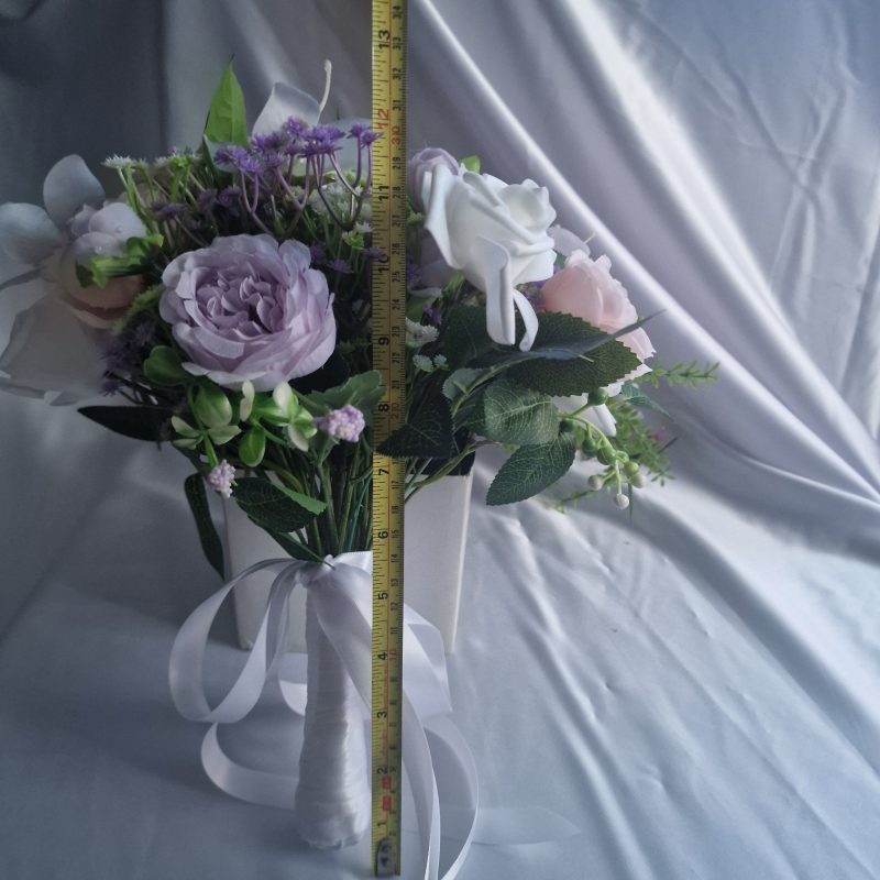 Wedding flower arrangements. All you need. Bride's bouquet, Groom's boutonniere, 4 Bridesmaid'sbouquets, 4 Groomsman boutonnieres, Flower basket & headpiece for Flower girl, "Something blue'. All handmade from artificial silk flowers.