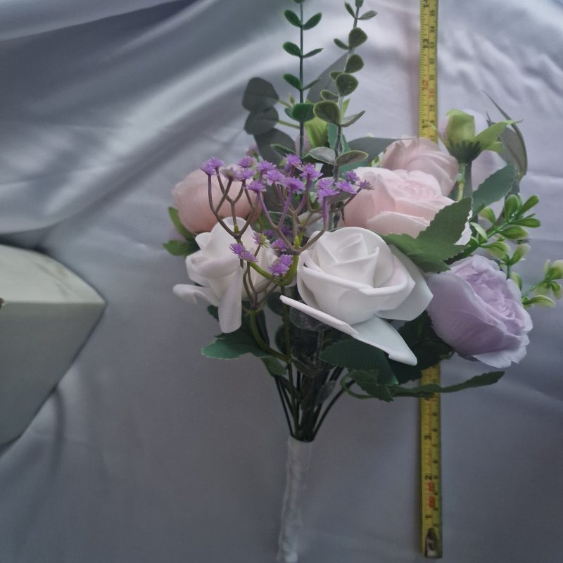 Wedding flower arrangements. All you need. Bride's bouquet, Groom's boutonniere, 4 Bridesmaid'sbouquets, 4 Groomsman boutonnieres, Flower basket & headpiece for Flower girl, "Something blue'. All handmade from artificial silk flowers.