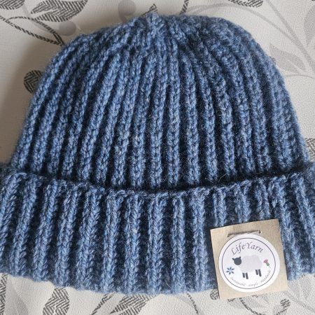 Handknitted 100% wool hat.