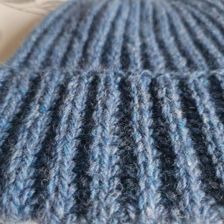 Handknitted 100% wool hat.