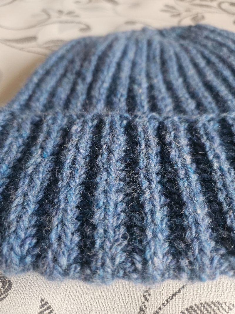 Handknitted 100% wool hat.