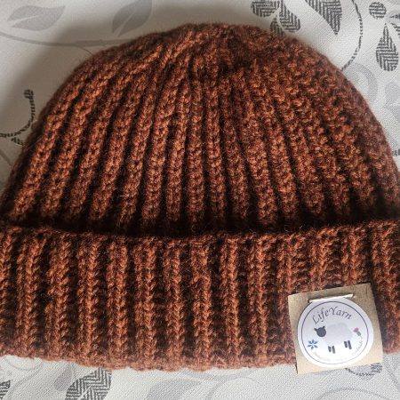 Handknitted 100% wool hat.