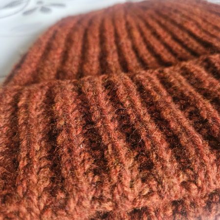 Handknitted 100% wool hat.