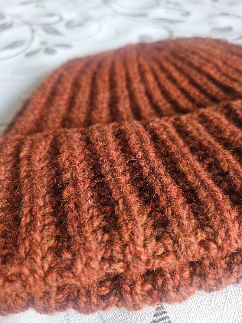 Handknitted 100% wool hat.