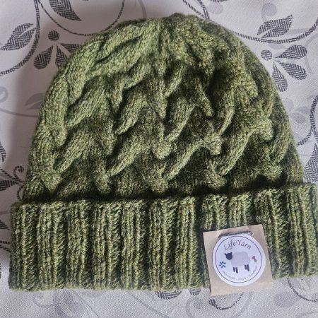 Handknitted 100% wool cabled hat.