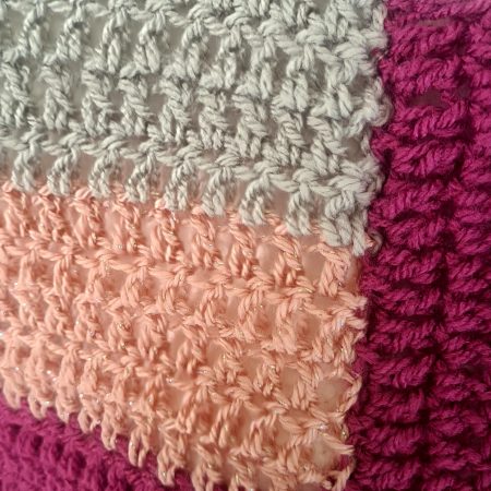 Pink crochet poncho