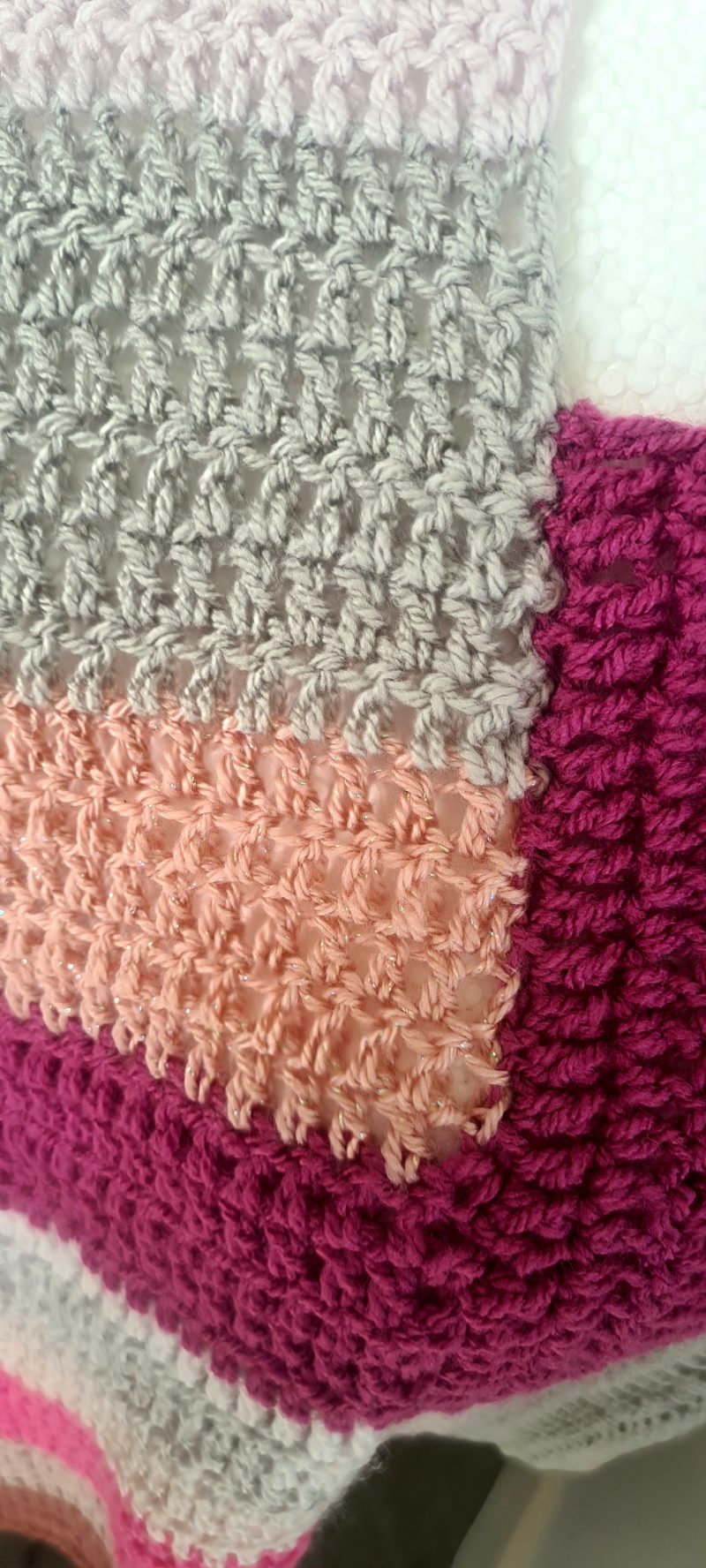 Pink crochet poncho