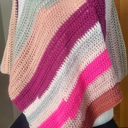 Pink crochet poncho
