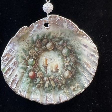 Shell-shaped Christmas ornament with decoupage and resin