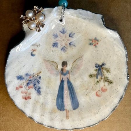 Christmas ornament shell with decoupage and resin