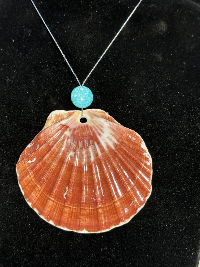 Christmas ornament shell with hanging feature