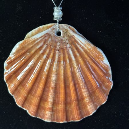 Christmas ornament shell with hanging feature