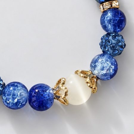 Blue glass beaded stretch bracelet with white cat's eye