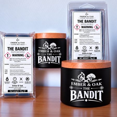 The Bandit candles, wax melts and snap bar packaging, showing product labels and safety warnings.
