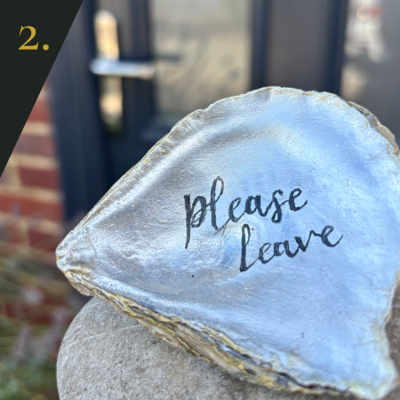 SHUCKED's oyster shell edition no.2, with message "please leave"